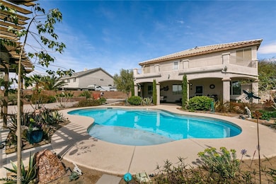 View of swimming pool with a patio.