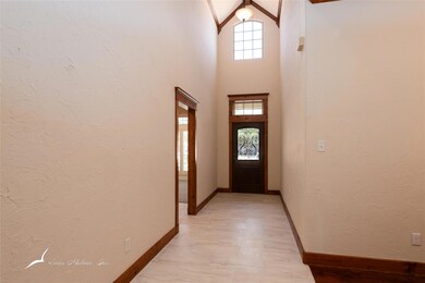 Front entry with an abundance of natural light and