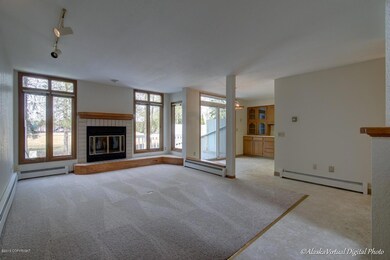 Large living room with huge windows!