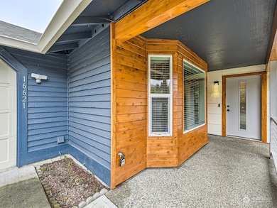Covered Front Porch with new Cedar plank siding