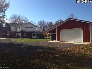 back view with extra garage
