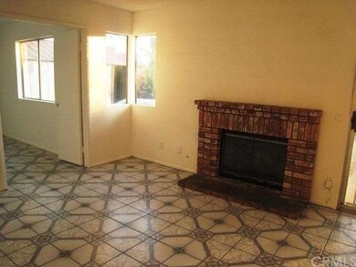 Family room with fireplace.