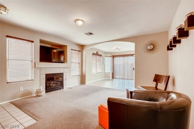View of living room opening to kitchen dining