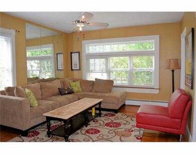 Living Room. Replacement windows provide both grea