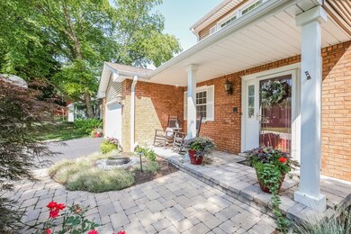 BRICK SIDEWALK, COVERED FRONT PORCH, GRANITE FOUNT