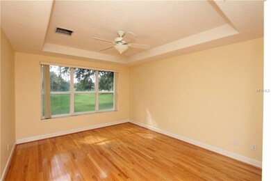 Master's retreat featuring solid wood floors and v