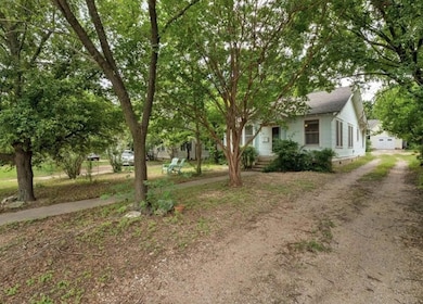 View of front of property with crawl space