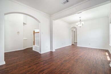 A look at the living and rooms off the kitchen and