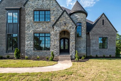 View of front of home with a front lawn