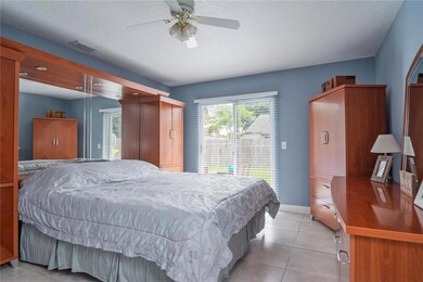 This large Master Bedroom looks out onto the priva