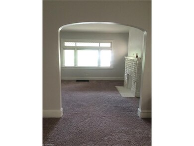 Down unit living room highlighted by leaded glass 