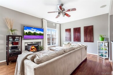 Spacious Family Room with gas Fireplace, wood floo
