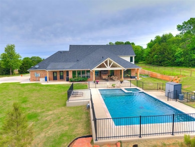 View of pool featuring a patio and a pool with con