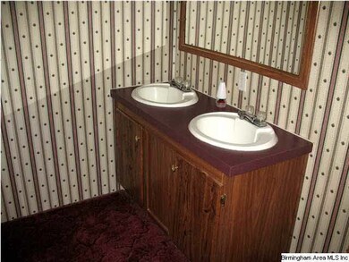 The Master Bathroom has a double-sink vanity.