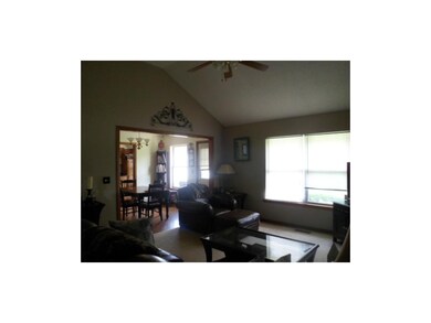 Living room with vaulted ceiling