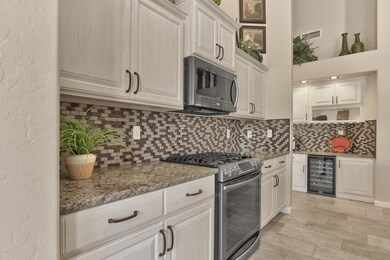 UPGRADED BACKSPLASH & CABINETRY