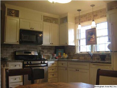 Pretty cabinets and a kitchen big enough to eat in