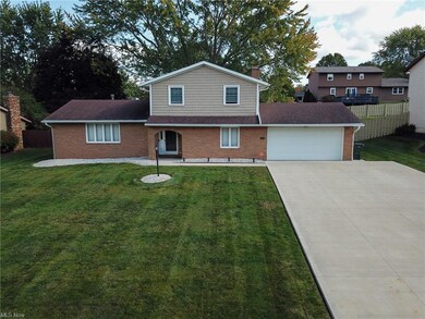View of front of property with a front lawn and a 