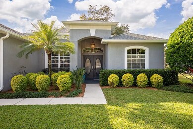 Lovely covered landing and ornate front door.
