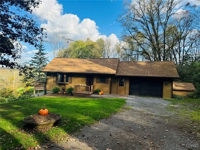 Driveway View with Attached Garage