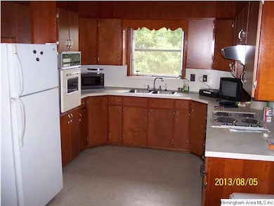 Kitchen with solid wood custom made cabinets