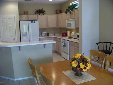Dining to Tiled Kitchen