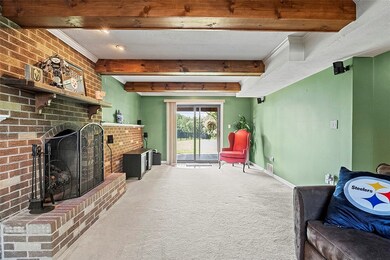Walkout of the game room onto a concrete patio