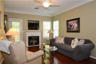 Den with fireplace. Open to kitchen for great entertaining.