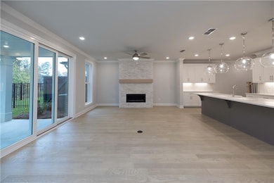 A fireplace highlights the living space. *Please n