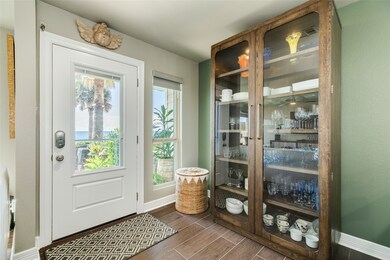 As you enter the home, you notice beautiful views