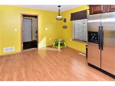 Eat-in kitchen with entrace to main floor laundry