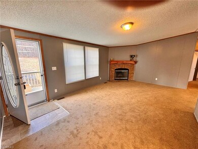 Great room with all new carpet, paint, blinds and light fixtures