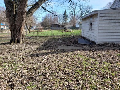 Behind garage