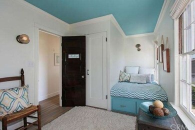 The most darling room with a built in bed . So New
