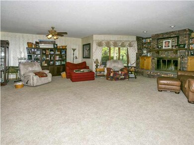 Huge main floor family room w/ wood burning firepl
