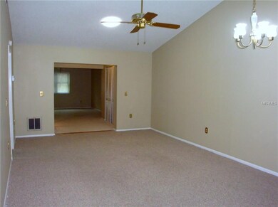 Living area into family room/den