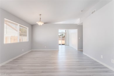 Empty room featuring light wood-type flooring and