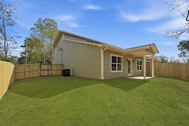 Backyard of 802 S Newsom, but 806 S Newsom is very similar-porch off side of home