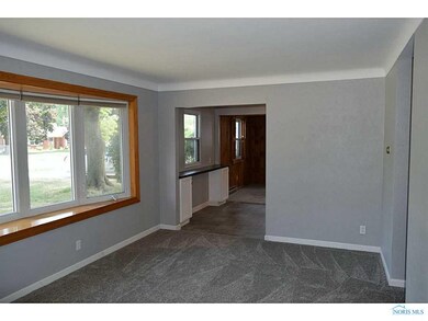 Living Room. Coved ceilings add charm