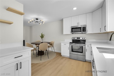 163 Greenbriar Townhouse Way, Las Vegas, NV 89121 - photo 2