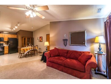 Open area from living room to dining room to kitch