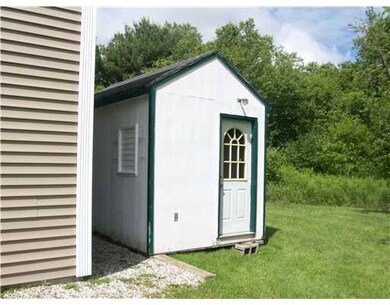 Storage. 8x12 shed behind garage