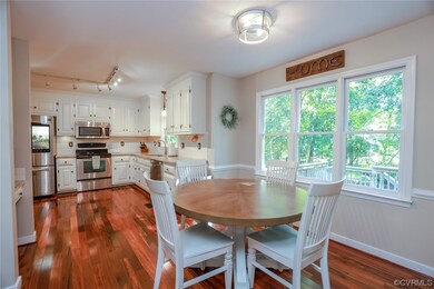 Updated eat-in kitchen with beautiful backyard vie