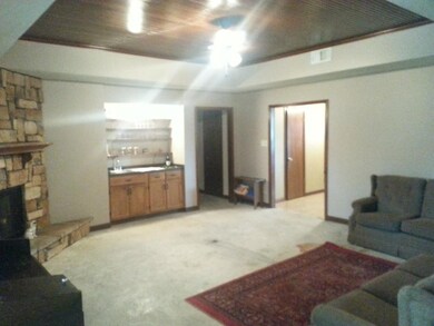 Den view with wetbar.