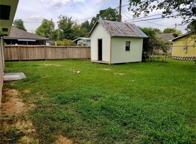 Large backyard with storage shed