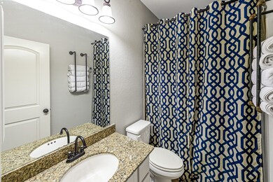 Downstairs bathroom near secondary bedroom.