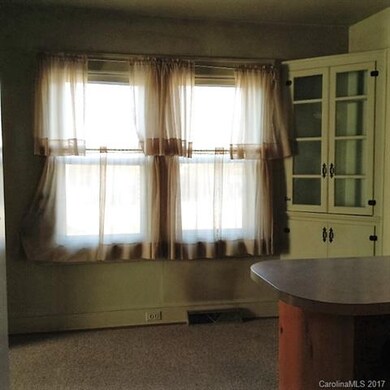 Breakfast Area.... Built in Corner Cabinet.