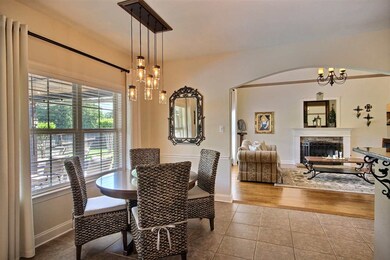 Breakfast Room overlooks park-like back yard with 