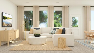 Living area with light hardwood / wood-style floor