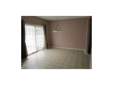 Dinette Area of Kitchen with Slider to Patio